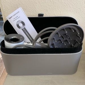 The Dyson Supersonic Hair Dryer- Used twice, brand NEW.